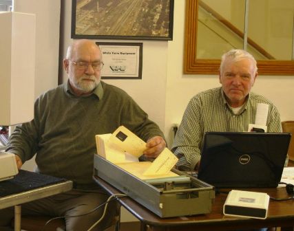 Loren Book and Arlin Wente processing first cards